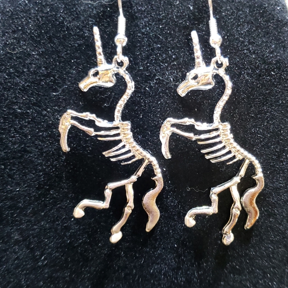 ⭐4/$20  Unicorn skeleton earrings